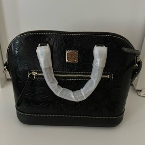 Disney Dooney and Bourke black leather Handbag.  New with tags.